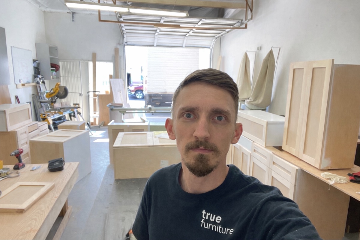 Bulat Abdullin, founder and lead craftsman of True Furniture, photographed in the Northridge workshop.